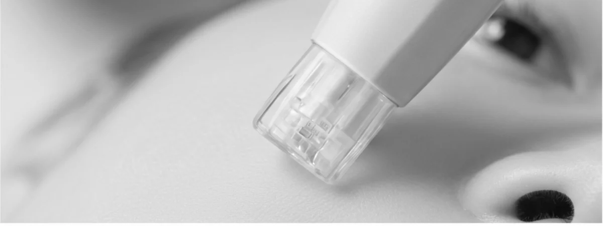 DERMAJET handpiece with a cartridge in contact with facial skin